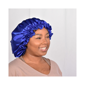 Cristina from Artis Styling wearing the Artis Styling Satin Adjustable bonnet in Royal